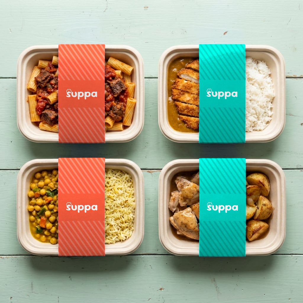 A stack of sealed Suppa meal trays, labelled and ready for the van